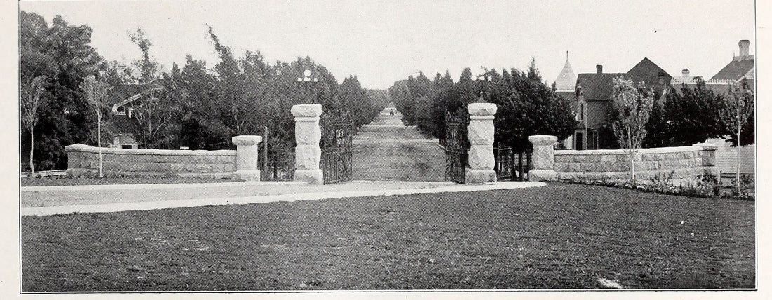Center Street, then University Avenue, from the University of Nevada gates in 1913, the turret of 829 at right. 1913 Artemisia yearbook, University of Nevada, public domain; scan by UNR Libraries via the Internet Archive.