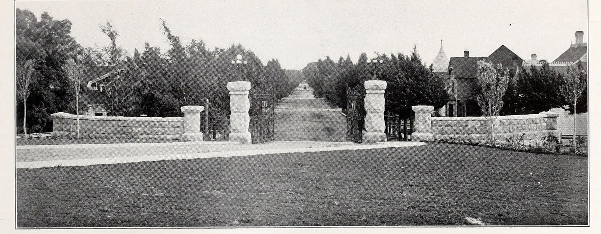 Center Street, then University Avenue, from the University of Nevada gates in 1913, the turret of 829 at right. 1913 Artemisia yearbook, University of Nevada, public domain; scan by UNR Libraries via the Internet Archive.
