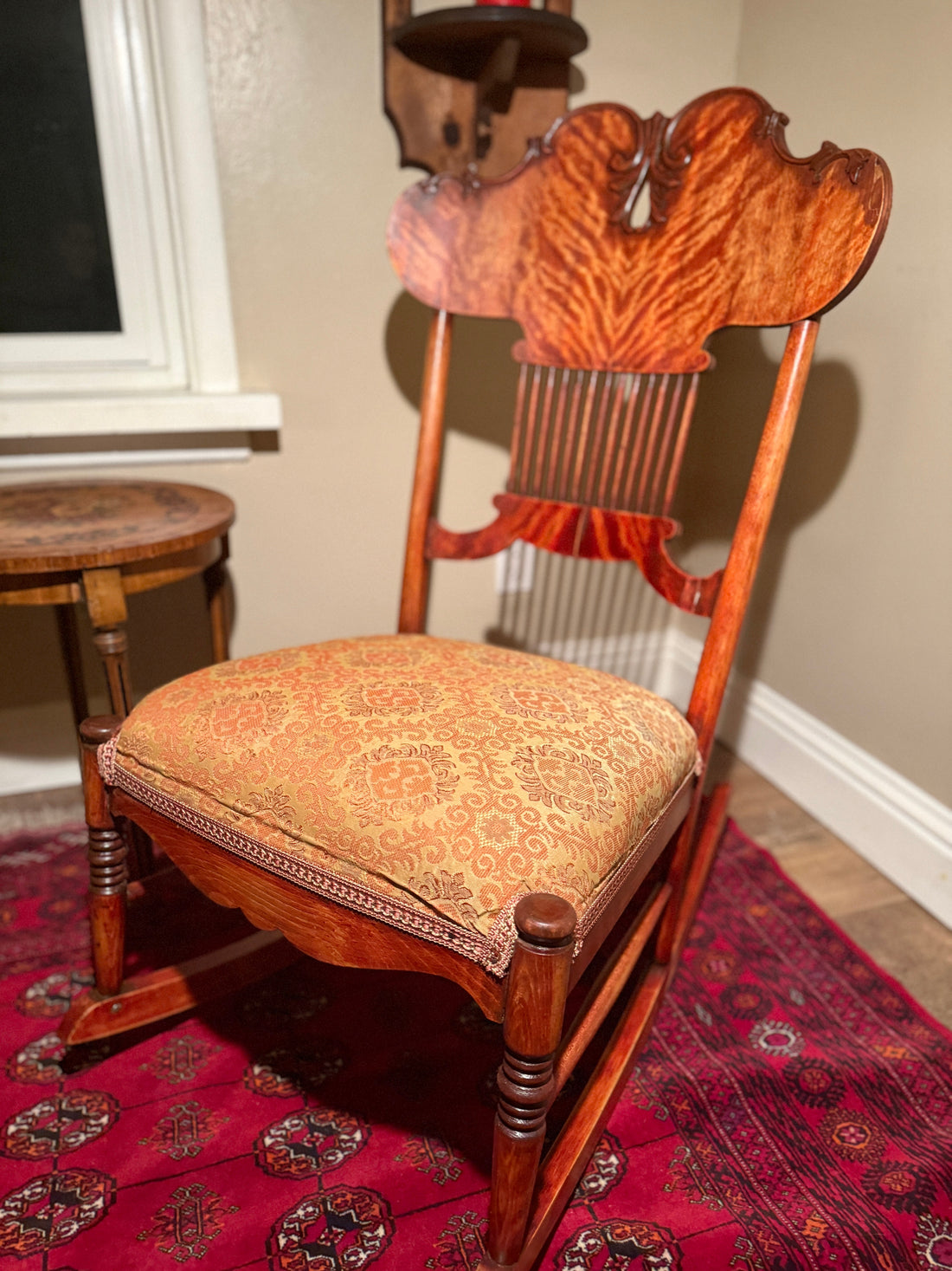 Victorian tiger oak pressed-back parlor rocking chair, a period chair whose joints reward careful re-gluing