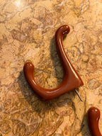 Pair of Vintage Brown Molded Plastic Double Wall Hooks, c. 1960s–1970s