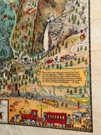 Vintage-style map with illustrations of people and activities in a scenic area.
