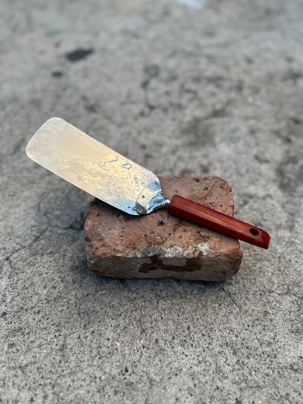 Androck Flexible Stainless Turner with Marbled Red Catalin Handle, Rockford Illinois, c. 1935–1955