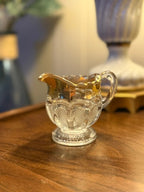 Gold-Trimmed Pressed Glass Creamer, Arched Panels on a Stippled Ground, c. 1895–1915