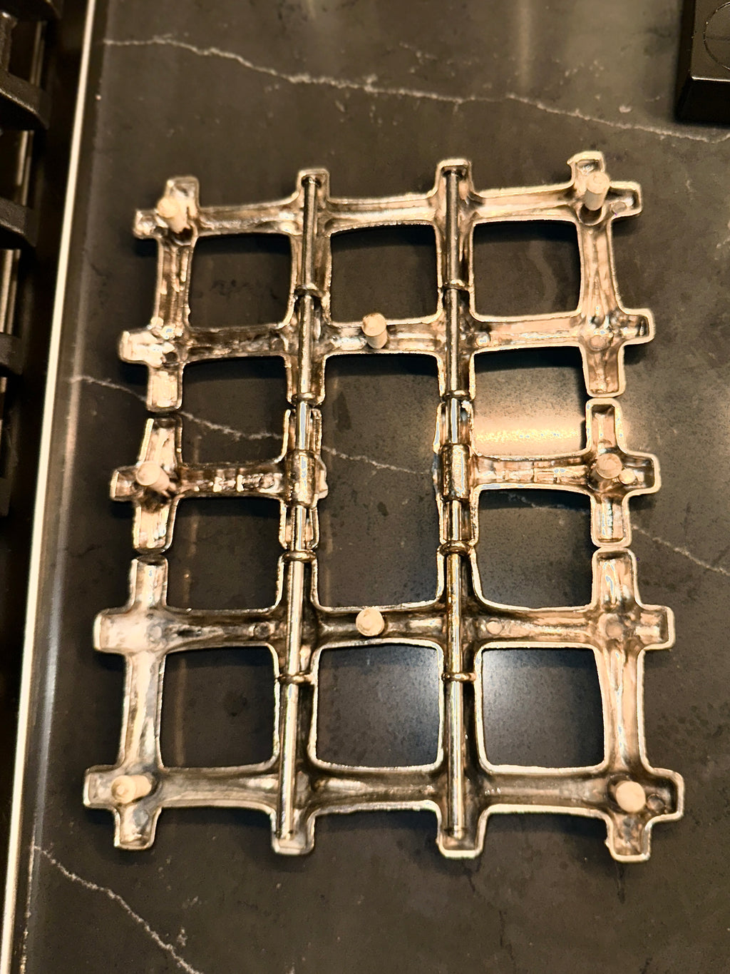 Mid-Century Expandable Cast Aluminum Trivet, c. 1950s–1960s