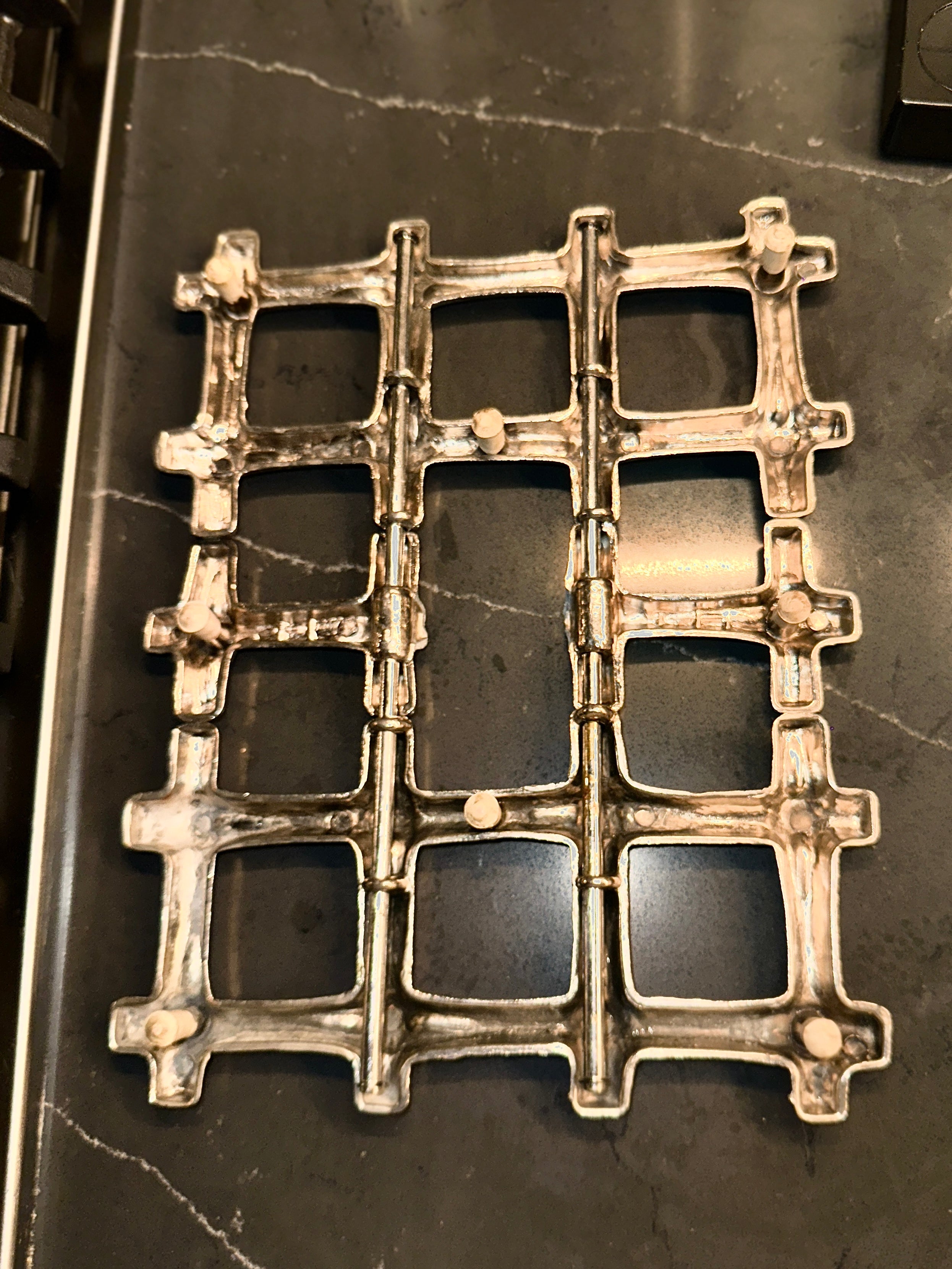 Mid-Century Expandable Cast Aluminum Trivet, c. 1950s–1960s