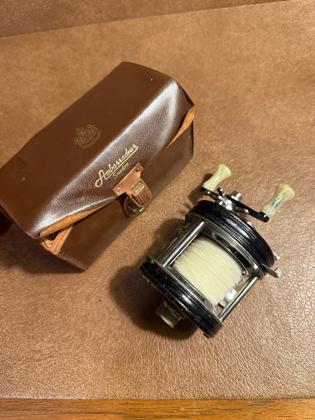 Vintage Ambassadeur 5000C Fishing Reel w/ Leather Case (c.1950s)