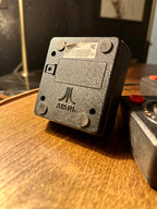 Set of Three Original Atari CX40 Joysticks with Framed Montgomery Ward Catalog Page, c. 1980s | Curated Reductions