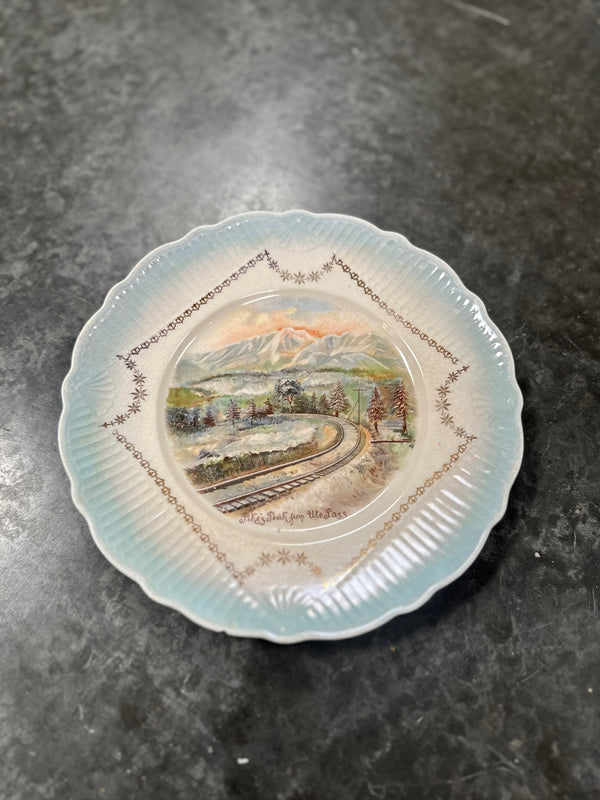 Hand-Painted Souvenir Plate, Pike's Peak from Ute Pass, Blue Lustre Ground with Gilt Swags, Signed and Dated A. Blickenstaff 1920