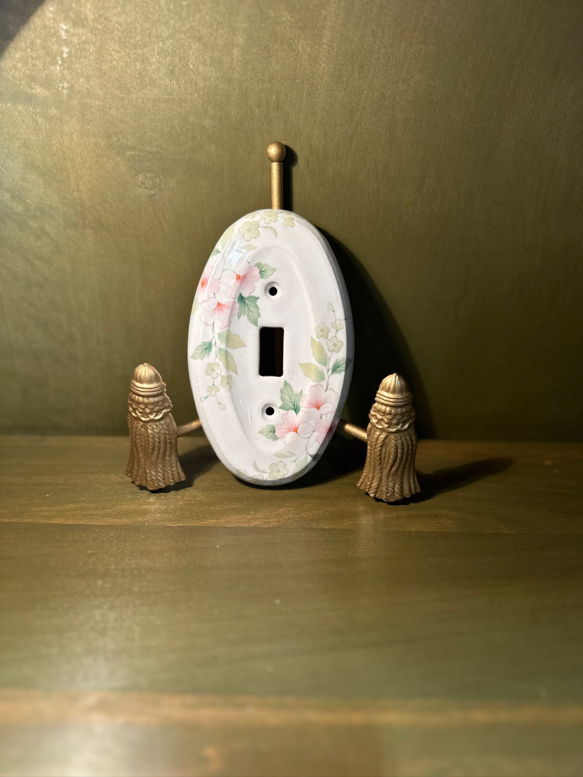 Porcelain Single-Toggle Switch Plate with Pink Dogwood Transfer Decoration, Oval Form, Unused with the Original Screws Still Sealed to the Reverse