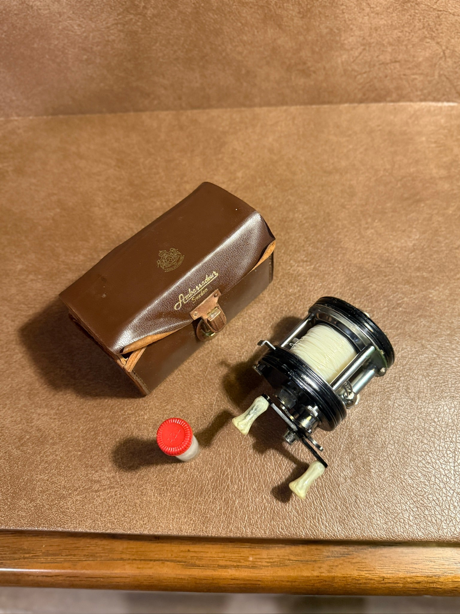 Vintage Ambassadeur 5000C Fishing Reel w/ Leather Case (c.1950s)