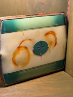 Art Deco Gilt-Metal Hand Mirror, Graduated Green and Cream Enamelled Back with Gold Pinstriping, Stepped Fan Palmette and Reeded Handle, Bevelled Plate, c. 1925–1940