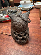 Cast iron owl candle holder
