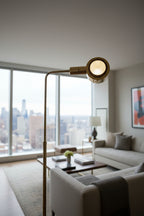 Close-up of a gold shower head with blurred background