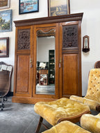 Antique Edwardian Art Nouveau Carved Oak Triple Wardrobe, Bevelled Mirror Door, Poppy and Bird-Head Panels, c. 1900–1910