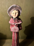 Three Hand-Painted Victorian Caroler Figures, Elongated Folk-Art Modelling with Dry-Brushed Antique Finish, Muffs, Bonnets and a Bell-Hung Wreath, Sold as a Set, c. 1985–2000