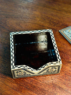 Set of Six Damascene Marquetry and Mother-of-Pearl Coasters with Fitted Caddy, Syria, c. 1940–1970