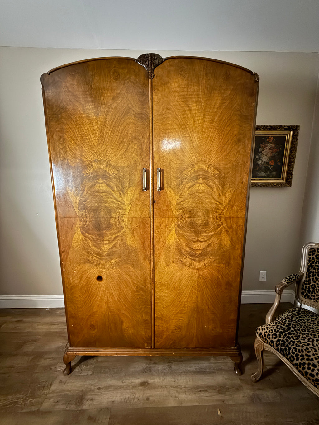 Art Deco Walnut Veneer Wardrobe with Carved Floral Crown and Book-Matched Burl Panels, c 1930s