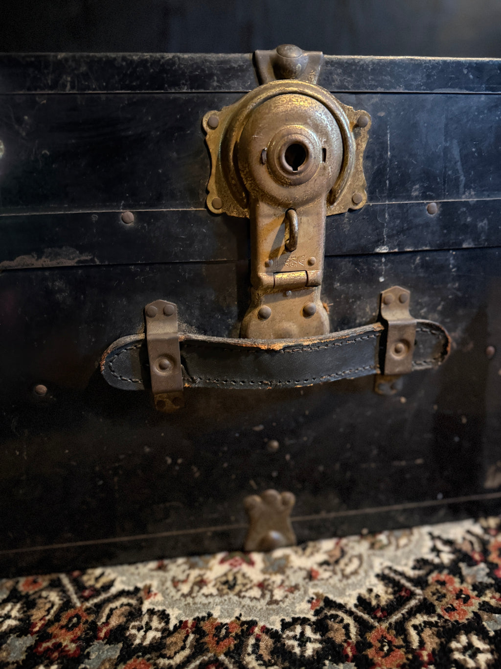c. 1920 Black Japanned Steel Steamer Trunk with Brass Trim and Circular Lock