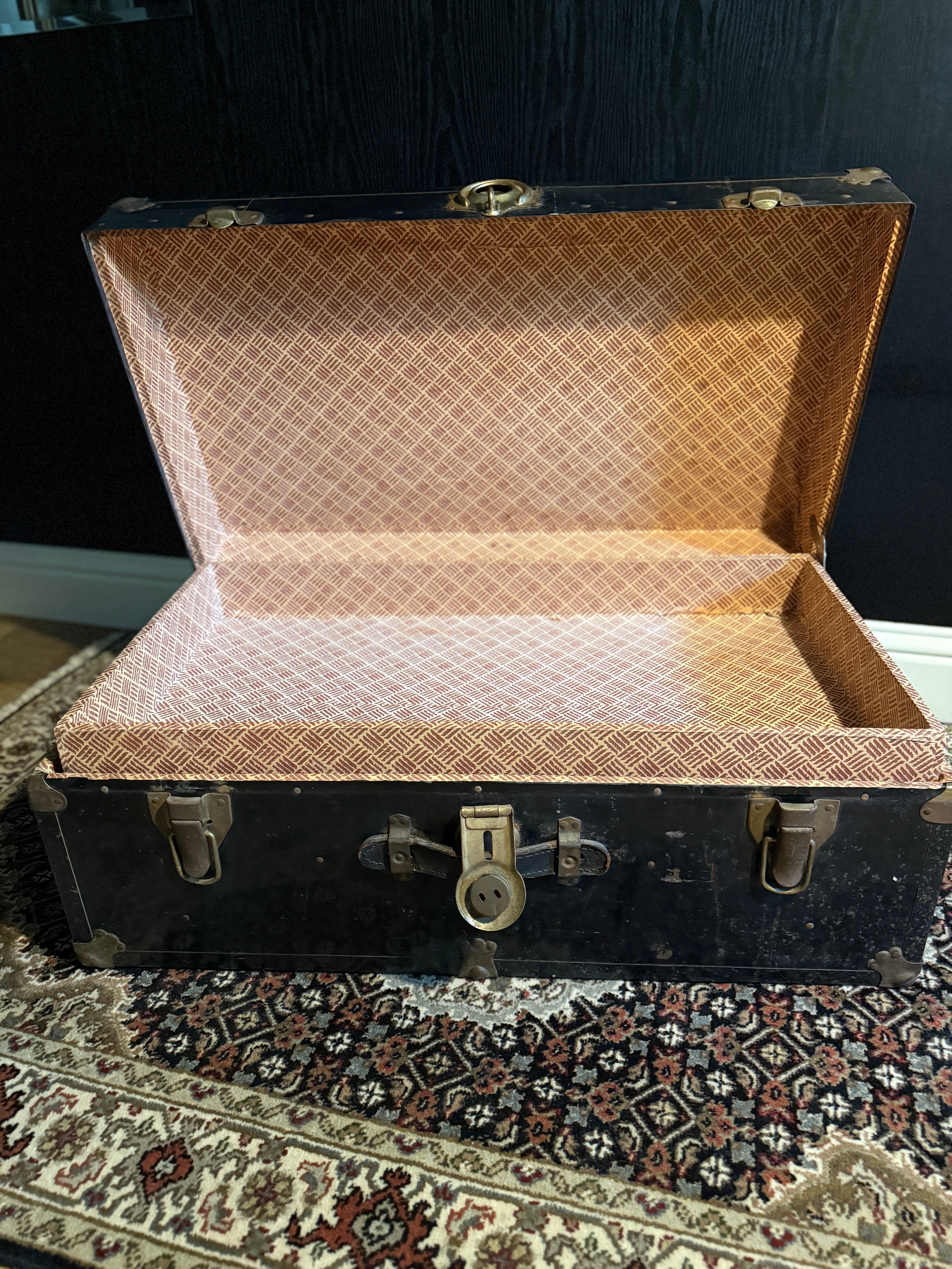 c. 1920 Black Japanned Steel Steamer Trunk with Brass Trim and Circular Lock