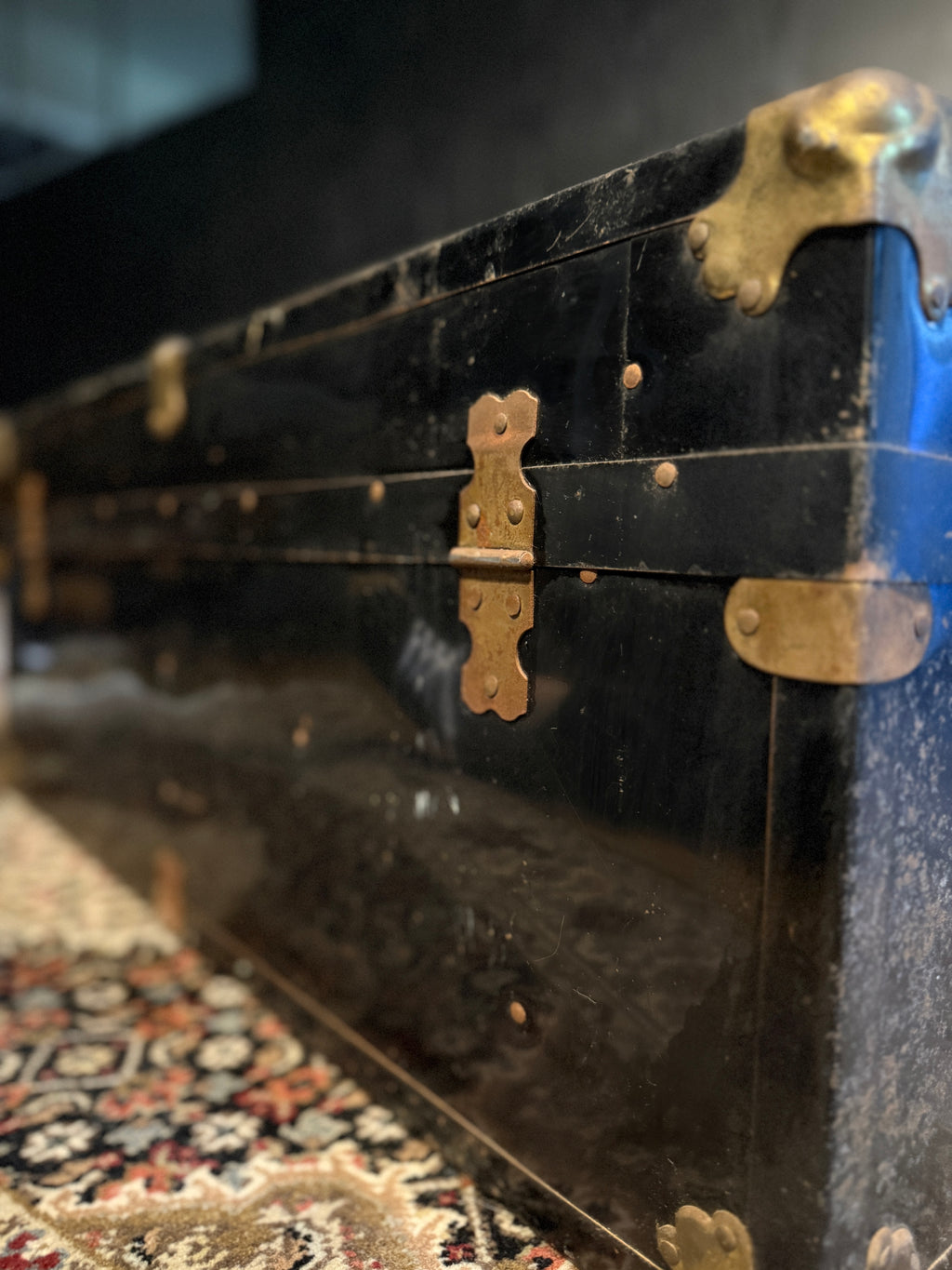 c. 1920 Black Japanned Steel Steamer Trunk with Brass Trim and Circular Lock