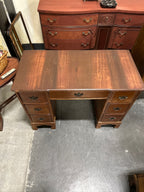 Colonial Revival Kneehole Desk, Seven Drawers with Batwing Brasses and Bracket Feet, Refinished by Walter Hinchman in Sedona Red, Antique Walnut and Mahogany, c. 1940–1955