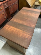 Colonial Revival Kneehole Desk, Seven Drawers with Batwing Brasses and Bracket Feet, Refinished by Walter Hinchman in Sedona Red, Antique Walnut and Mahogany, c. 1940–1955