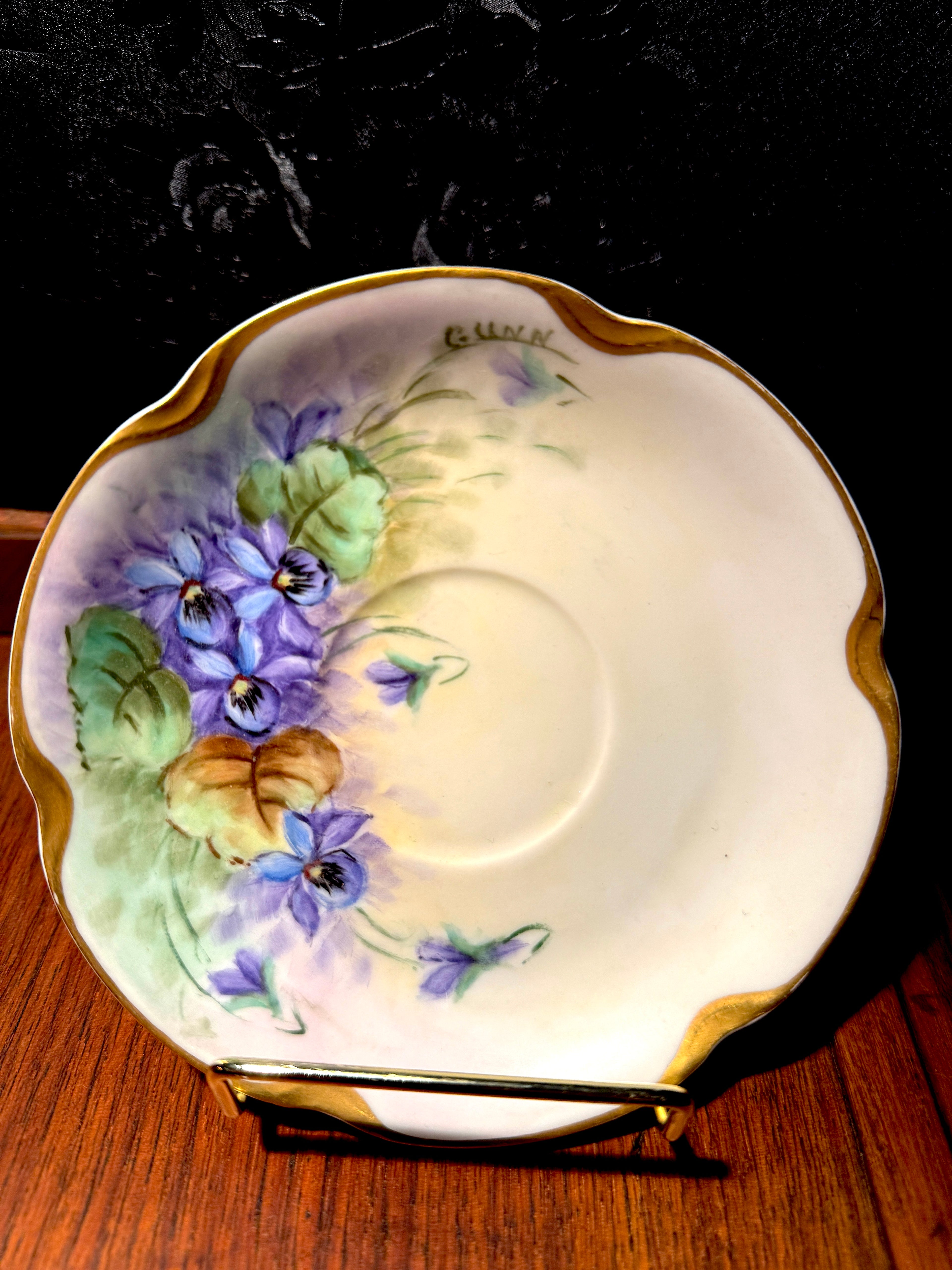 Hand-Painted Tirschenreuth Bavarian Porcelain Saucer (c. 1915–1930) — Signed GUNN, Violet Botanical & Gilt Rim