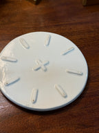 Embossed Rose Ceramic Trivet, Cream Glaze with Cobalt Banded Rim, c. 1940–1970