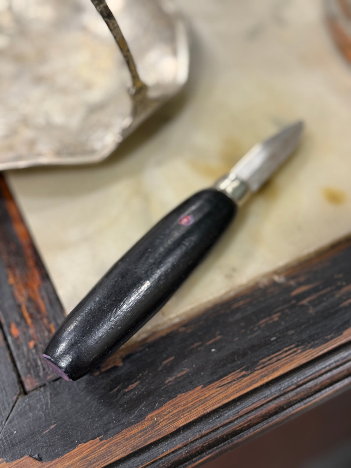 Small Fixed-Blade Paring Knife, Ebonized Handle with Nickel Ferrule and Inlaid Maker's Medallion, c. 1930–1940