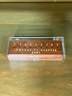 Drueke “Pocket Clapper Game” No. 154, Walnut Dice-and-Peg Game with Original Rules and Case, Grand Rapids, c. 1965–1983