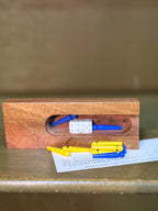 Drueke “Pocket Clapper Game” No. 154, Walnut Dice-and-Peg Game with Original Rules and Case, Grand Rapids, c. 1965–1983