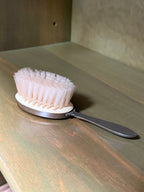 Silver-Backed Child's Hairbrush with Embossed Rabbit Medallion, c. 1925–1950