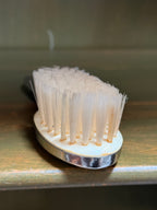 Silver-Backed Child's Hairbrush with Embossed Rabbit Medallion, c. 1925–1950