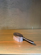 Silver-Backed Child's Hairbrush with Embossed Rabbit Medallion, c. 1925–1950