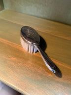 Silver-Backed Child's Hairbrush with Embossed Rabbit Medallion, c. 1925–1950