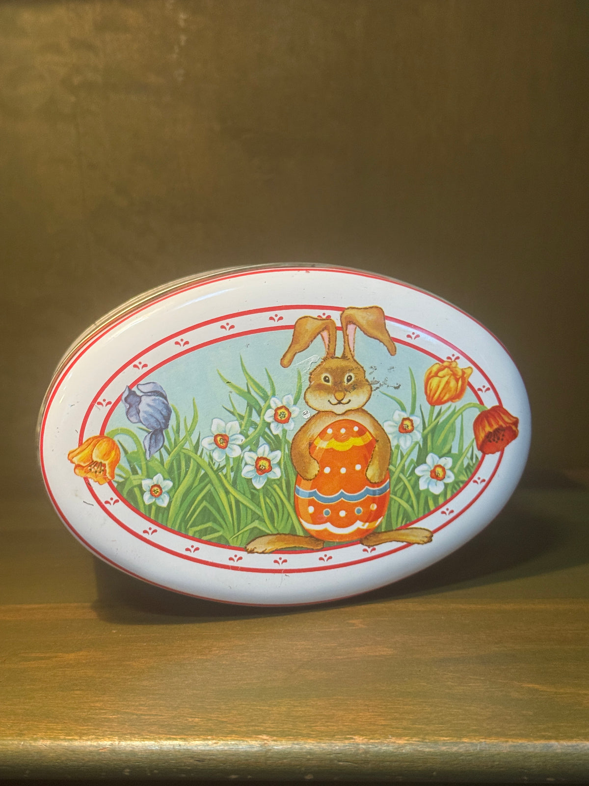 Daher Easter Tin, Oval Lidded Container Lithographed with a Rabbit and Spring Bulbs on Red and White Stripe, English-Made for Daher of Long Island City, c. 1963–1980