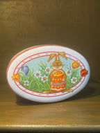 Daher Easter Tin, Oval Lidded Container Lithographed with a Rabbit and Spring Bulbs on Red and White Stripe, English-Made for Daher of Long Island City, c. 1963–1980
