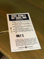 General Electric Model F47 Spray, Steam & Dry Travel Iron in Chrome and Cast Aluminium, Complete with Original Box and Hang Tag, c. 1960–1970