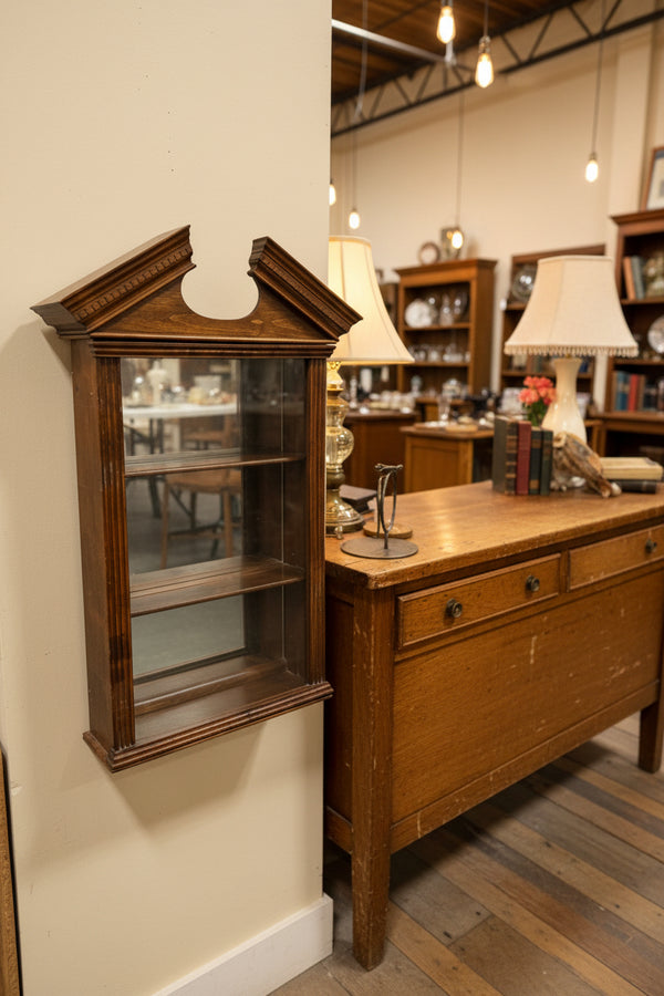 Wall-Hung Glazed Curio Display Cabinet with Broken Pediment and Dentil Cornice, Mirrored Back over Two Shelves, Original Hanging Label, American, c. 1940–1970