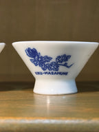 Pair of Kiku-Masamune Sakazuki, Footed Porcelain Sake Cups Printed in Cobalt with a Chrysanthemum Spray, Marked Made in Japan and 菊正宗 — Brewery Cups from a House Brewing Since 1659, c. 1955–1970